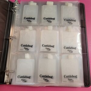Cuttlebug Sizzix Embossing Folders 2" X 2 3/4".  Set Of 56.  In Binder (0446)